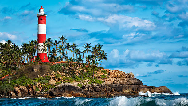 kovalam vizhinjam маяк. керала, индия - storm lighthouse cloudscape sea стоковые фото и изображения