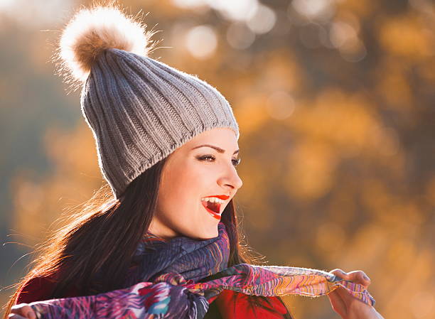 istock Woman red coat and gray hat, scarf 493941562