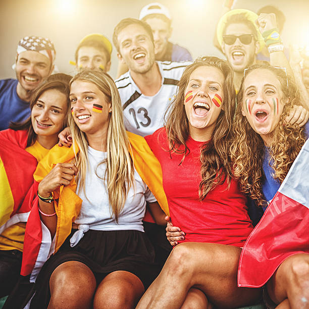 istock mixed national world supporter at the soccer stadium 493953209