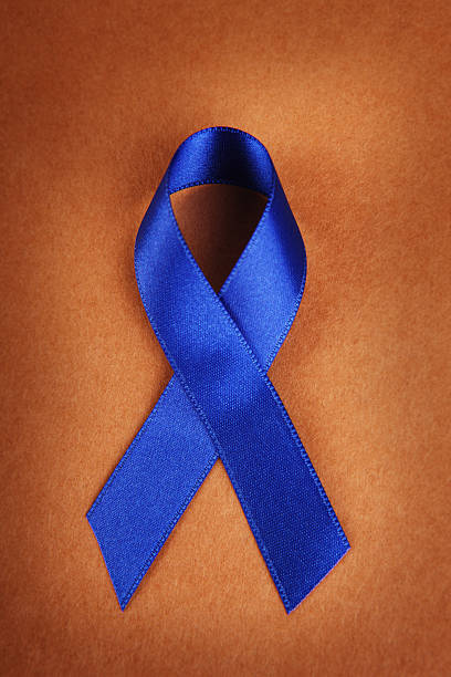 Dark Blue Awareness Ribbon on Brown