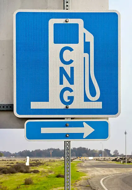 Sign shows an arrow direction of the nearest CNG station.
