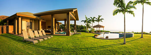 istock Home with large green lawn 493954867