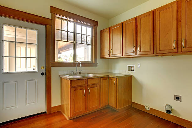 istock Laundry room with sink. New luxury home interior. 493955947