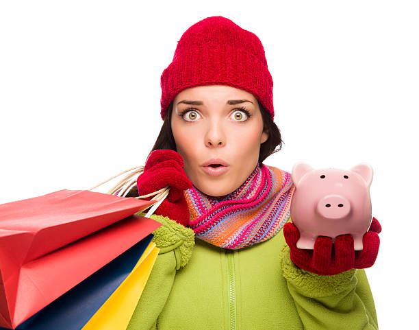 関連する異人種のショッピングバッグを持つ女性 piggybank - christmas emotional stress shopping holiday ストックフォトと画像