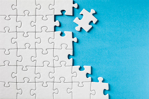 Jigsaw Puzzle on Blue http://www.thomas-vogel.de/istock/is_puzzle.jpg jigsaw piece photos stock pictures, royalty-free photos & images
