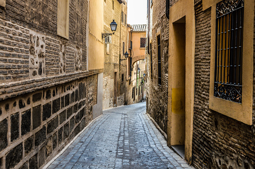Narrow medieval street in Toledo, Spain