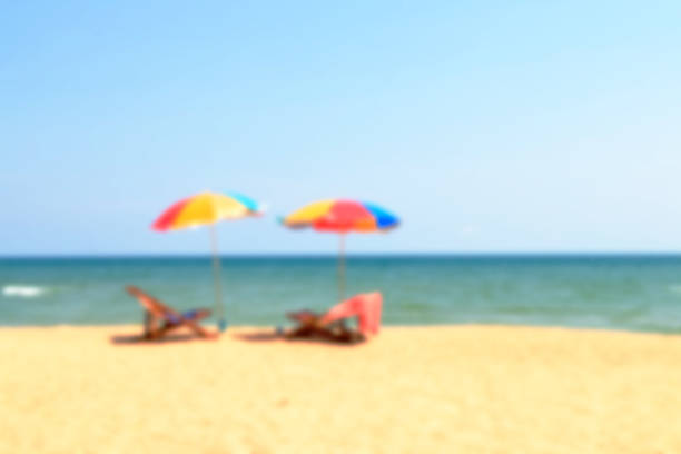 istock Beach chair and umbrella 493969174