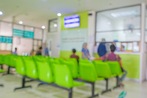 istock Blurred image of people in hospital waiting 493969296