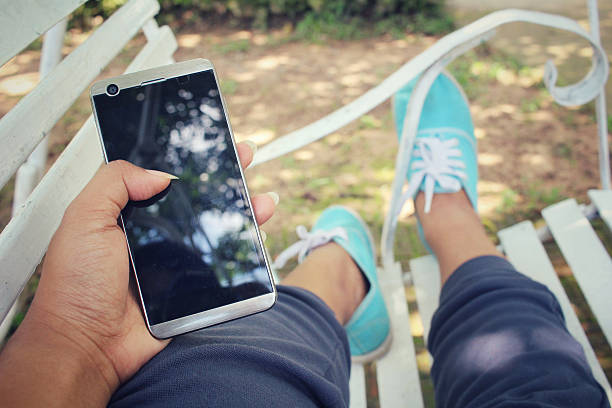 istock Selfie of smart phone on bench 493970194