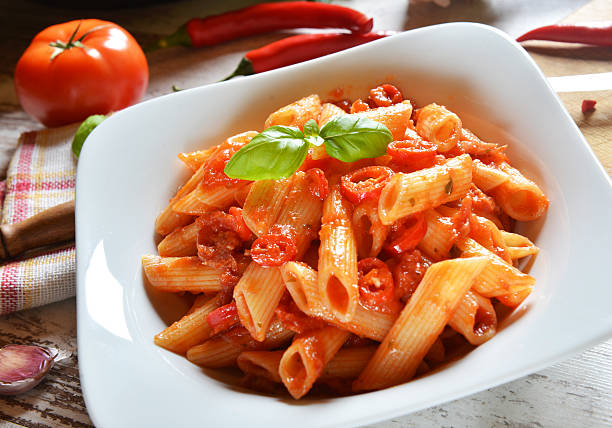 istock Penne pasta with chili sauce arrabiata 493970344