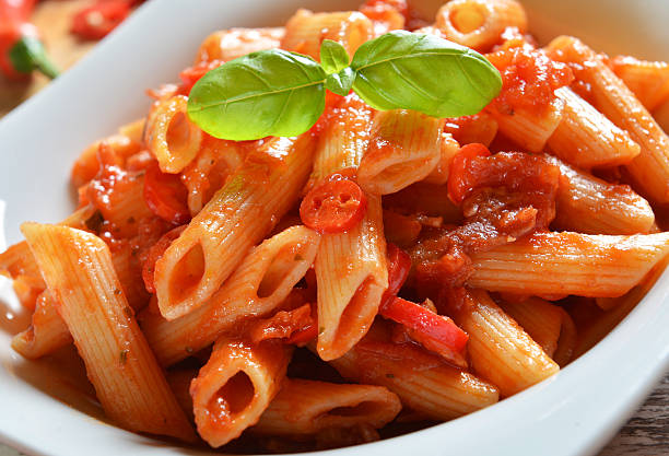 istock Penne pasta with chili sauce arrabiata 493970944