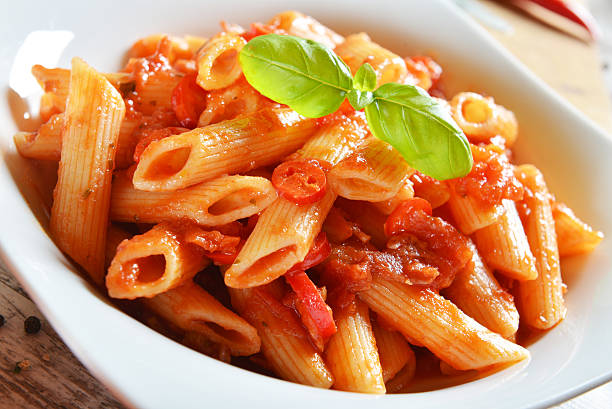 istock Penne pasta with chili sauce arrabiata 493971048
