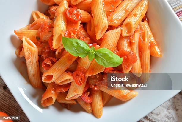 Penne Pasta With Chili Sauce Arrabiata Stock Photo - Download Image Now - 2015, Arrabbiata Sauce, Backgrounds