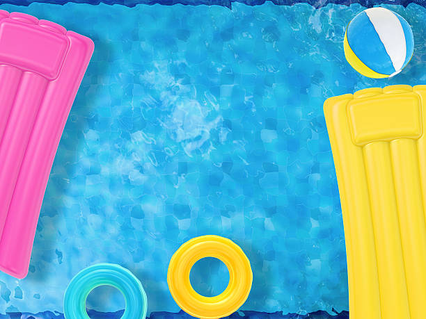 istock summer fun with inflatable toys floating on pool top view 493973358