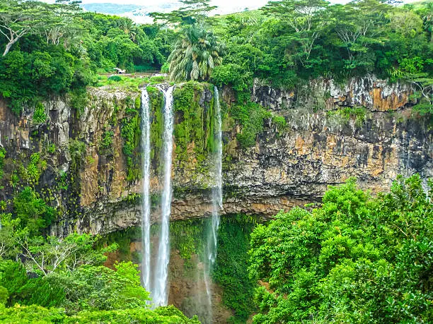 The Chamarel falls, 100 meters high, the most famous waterfalls in Mauritius at a short distance from the colored earth, Mauritius, Indian Ocean.
