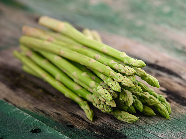 istock asparagus on old wooden 493976596
