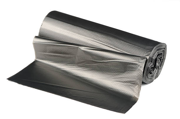 istock Roll of Garbage Bags Isolated on White Background 493977844