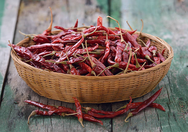 istock dried chili in the basket on old wooden 493978152