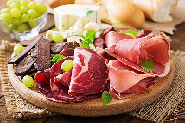 istock Antipasto catering platter with bacon, jerky, sausage, blue cheese 493978392