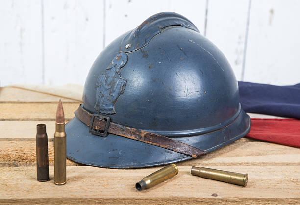 istock french helmet and old french flag 493980721