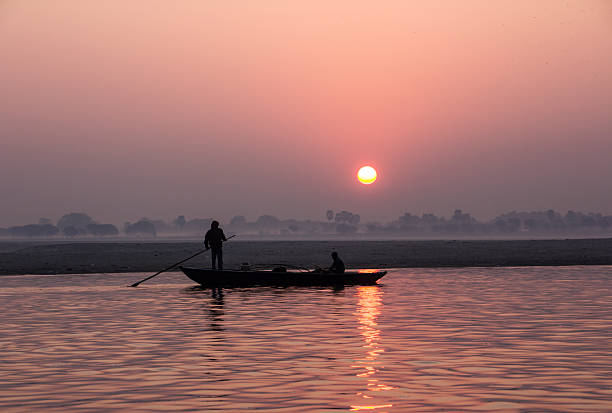 istock fisherman at sunrise 493980829