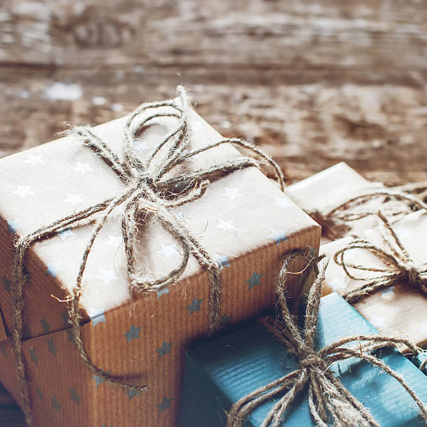 istock Festive Boxes in a Brown Paper with Linen Cord 493981326
