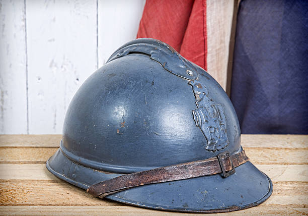 istock french helmet and old french flag 493981379
