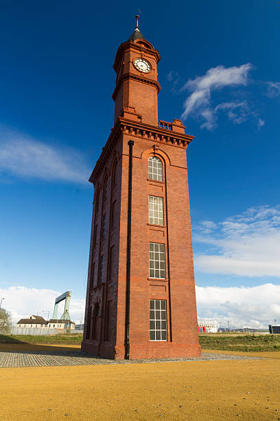 Clock Tower, Middlesbrough Dock Clocktower. England, United King With three clock faces, this structure doubled as clock tower and watertower providing hydraulic power. middlesbrough stock pictures, royalty-free photos & images