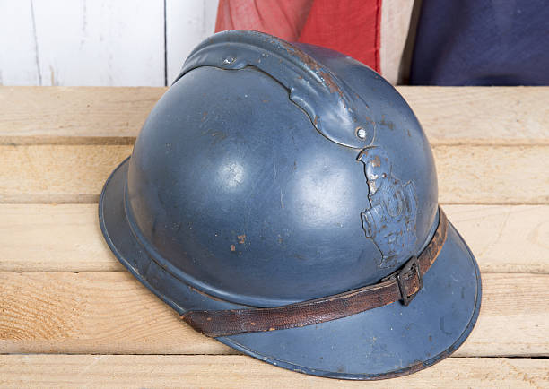 istock french helmet and old french flag 493983809
