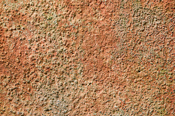 地中海のテラコッタの壁の背景 - stucco wall textured textured effect ストックフォトと画像