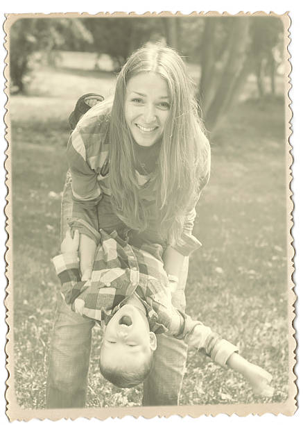 istock Retro photo with Vintage frame. Mother and Son have Fun 493994182