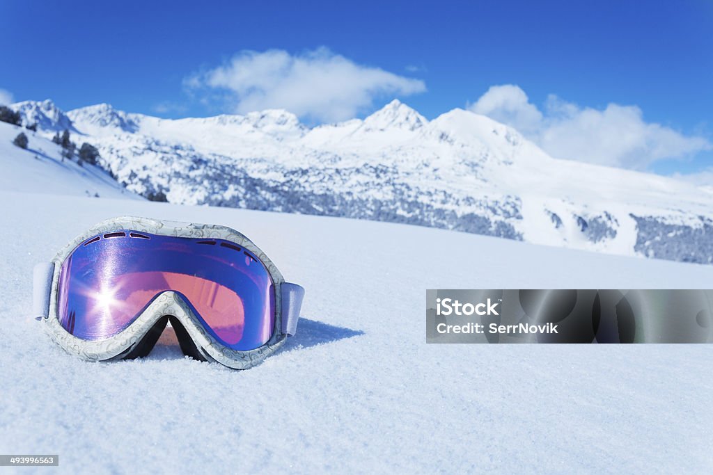 Ski mask Ski and snowboard mask in the snow with copy space and mountain on background Skiing Stock Photo