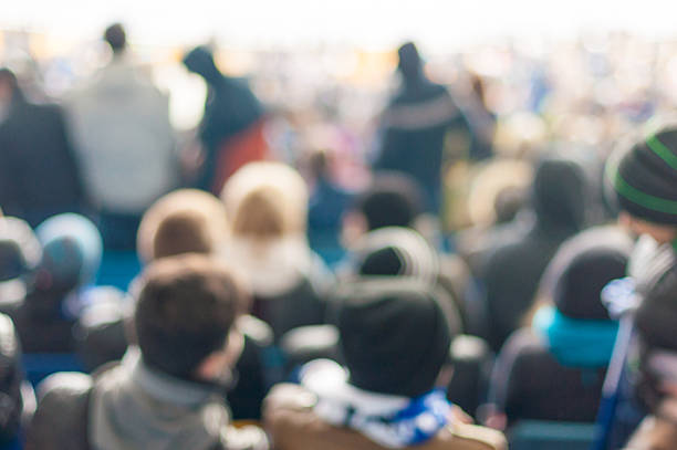 istock Blurred Crowd of People On stadium or ather populous place 493997034