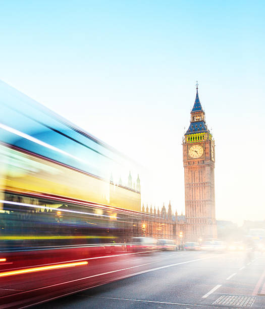 istock Big Ben with blurred double-decker bus in London UK 493998165