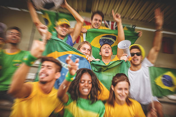 istock Group of brazilian supporters at stadium 493998201