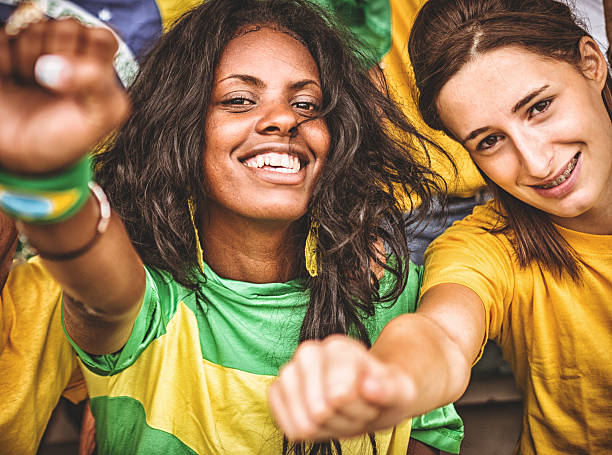 istock Group of brazilian supporters at stadium 493998207