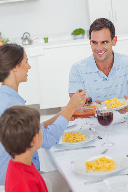 istock Woman serving husband during the dinner 493998433
