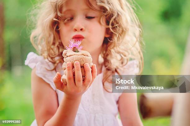 Child Girl Playing With Salt Dough Cake In Summer Stock Photo - Download Image Now - 2015, Activity, Art And Craft