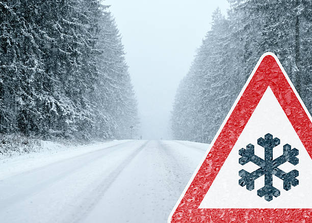 istock Winter Driving - Caution - Risk of Snow and Ice 493999680