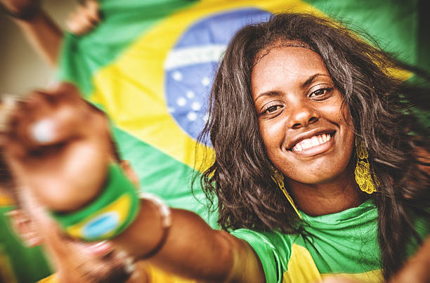 istock Group of brazilian supporters at stadium 493999709