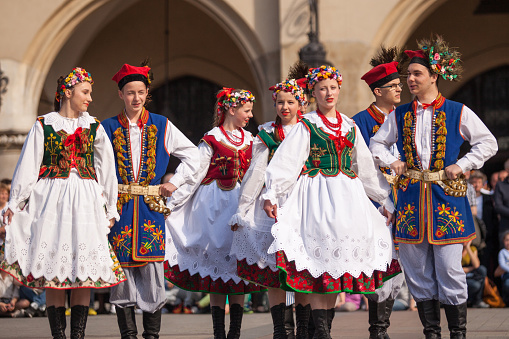 Krakow, Poland - May 3, 2015: Polish folk collective on Main square during annual Polish national and public holiday the Constitution Day - May 3, 1791 was adopted first Constitution of modern Europe.