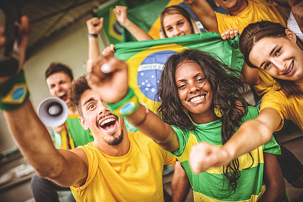 istock Group of brazilian supporters at stadium 494001493