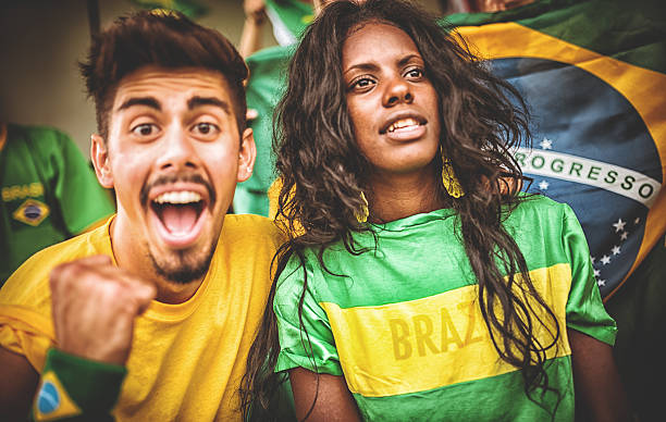istock Group of brazilian supporters at stadium 494001525