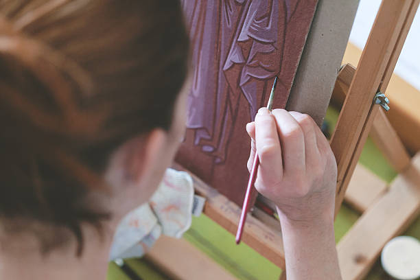 istock young woman painting 494003030