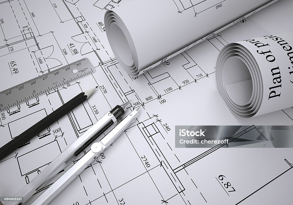 Scrolls of architectural drawings Scrolls of architectural drawings. The desk architect Architecture Stock Photo
