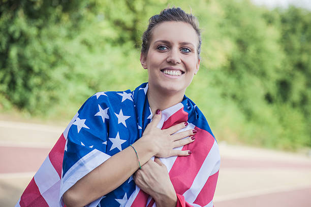istock Beautiful US athlete with national flag 494003329
