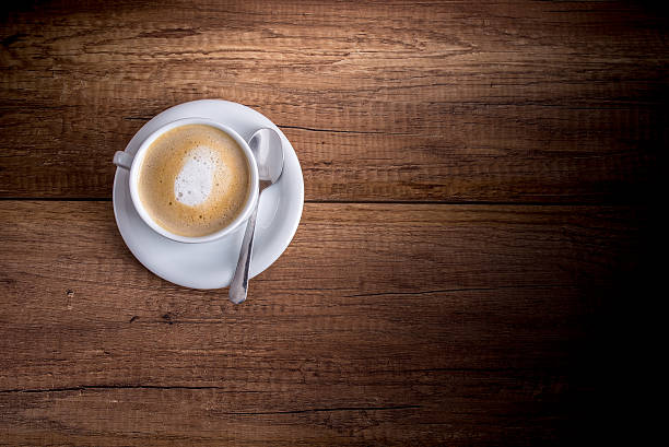 Cup of freshly brewed aromatic cappuccino