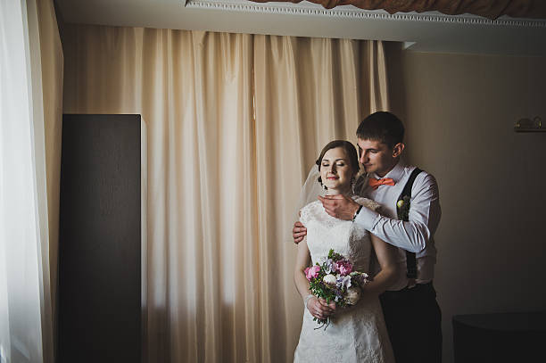 istock The man tenderly embraces his wife 494005140