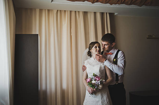 istock First hugs of the newlyweds 494005204