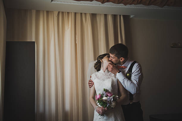 istock First hugs of the newlyweds 494005254